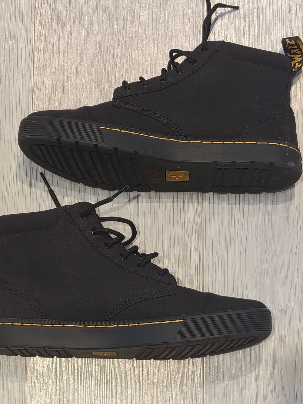 Dr. Martens Men’s Black High-Top Canvas Boots with Yellow Stitching